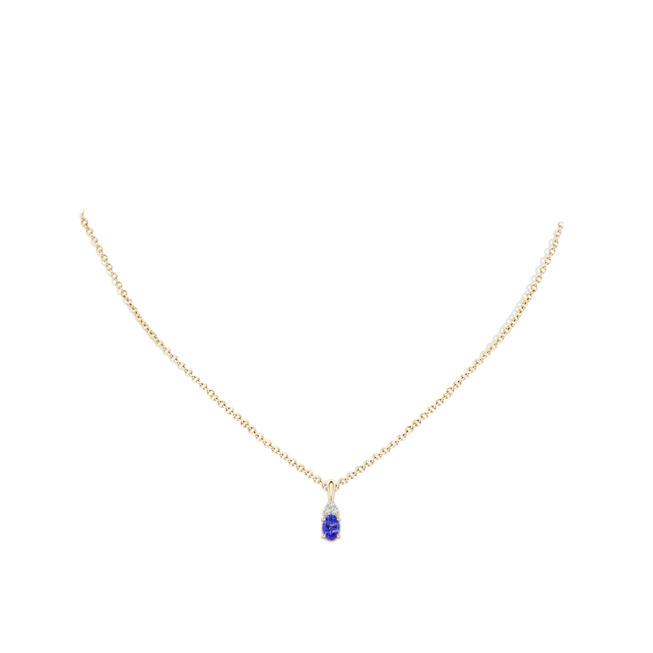 6x4mm AAAA Oval Tanzanite Solitaire Pendant with Trio Diamond in Yellow Gold body-neck