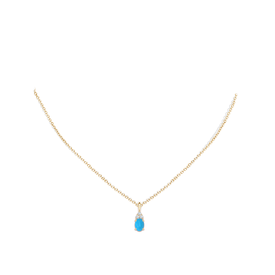 7x5mm AAAA Oval Turquoise Solitaire Pendant with Trio Diamond in Yellow Gold body-neck