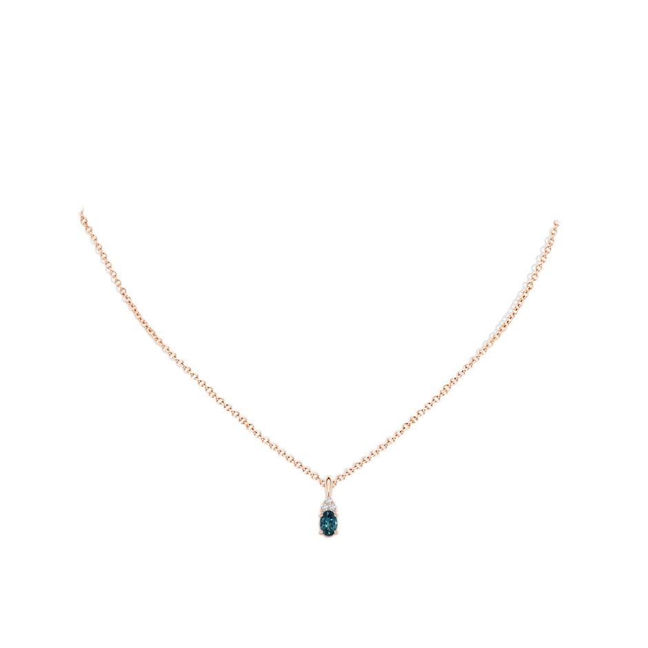 6x4mm AAA Oval Teal Montana Sapphire Solitaire Pendant with Trio Diamond in Rose Gold body-neck