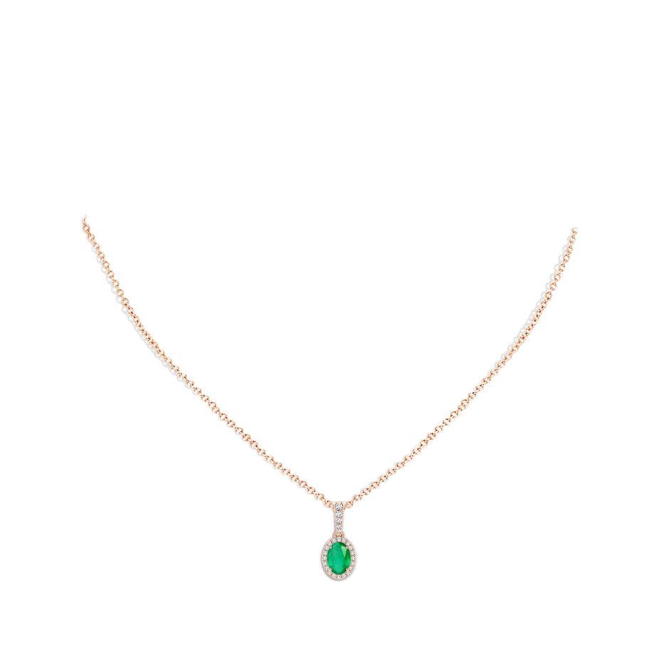 7x5mm A Vintage Style Oval Emerald Halo Pendant in Rose Gold body-neck