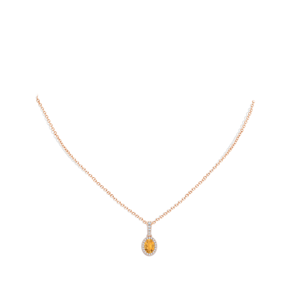 7x5mm A Vintage Style Oval Fire Opal Halo Pendant in Rose Gold body-neck