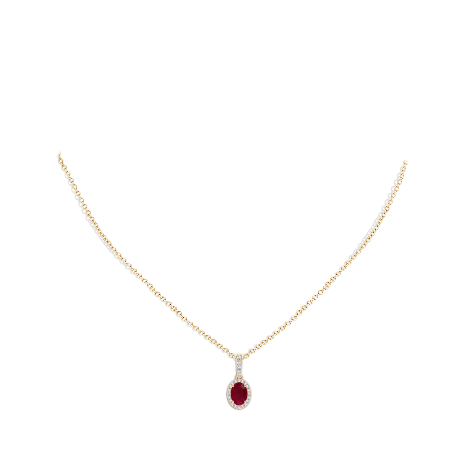 7x5mm A Vintage Style Oval Ruby Halo Pendant in Yellow Gold body-neck