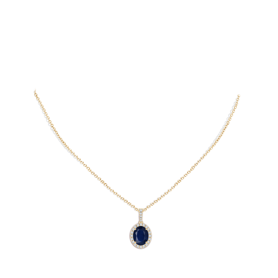 10x8mm A Vintage Style Oval Sapphire Halo Pendant in Yellow Gold pen