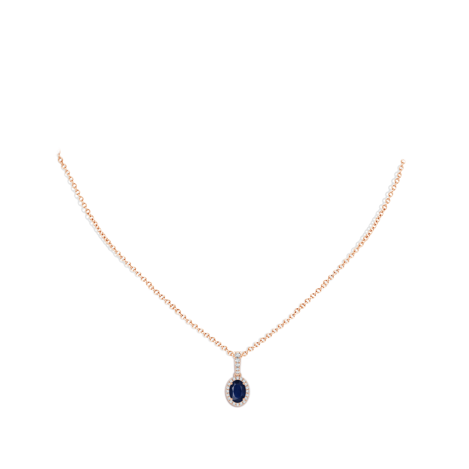 7x5mm A Vintage Style Oval Sapphire Halo Pendant in Rose Gold pen