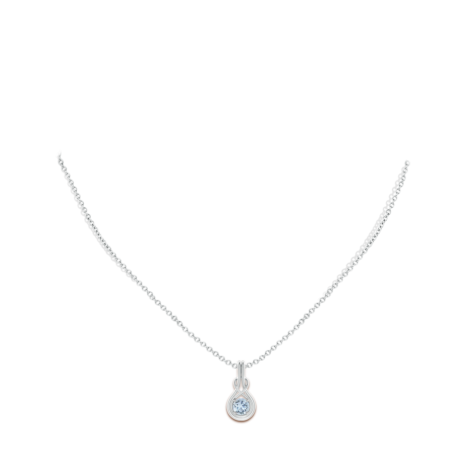 5mm A Round Aquamarine Solitaire Infinity Knot Pendant in P950 Platinum pen