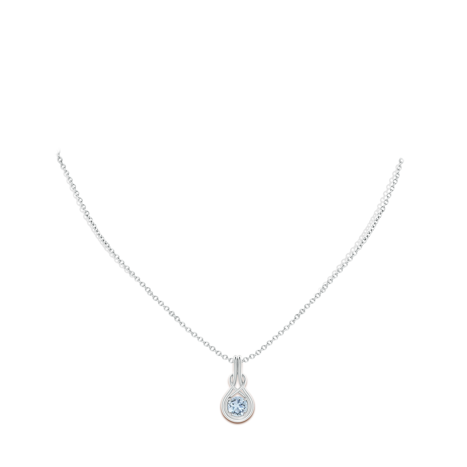 6mm A Round Aquamarine Solitaire Infinity Knot Pendant in P950 Platinum pen