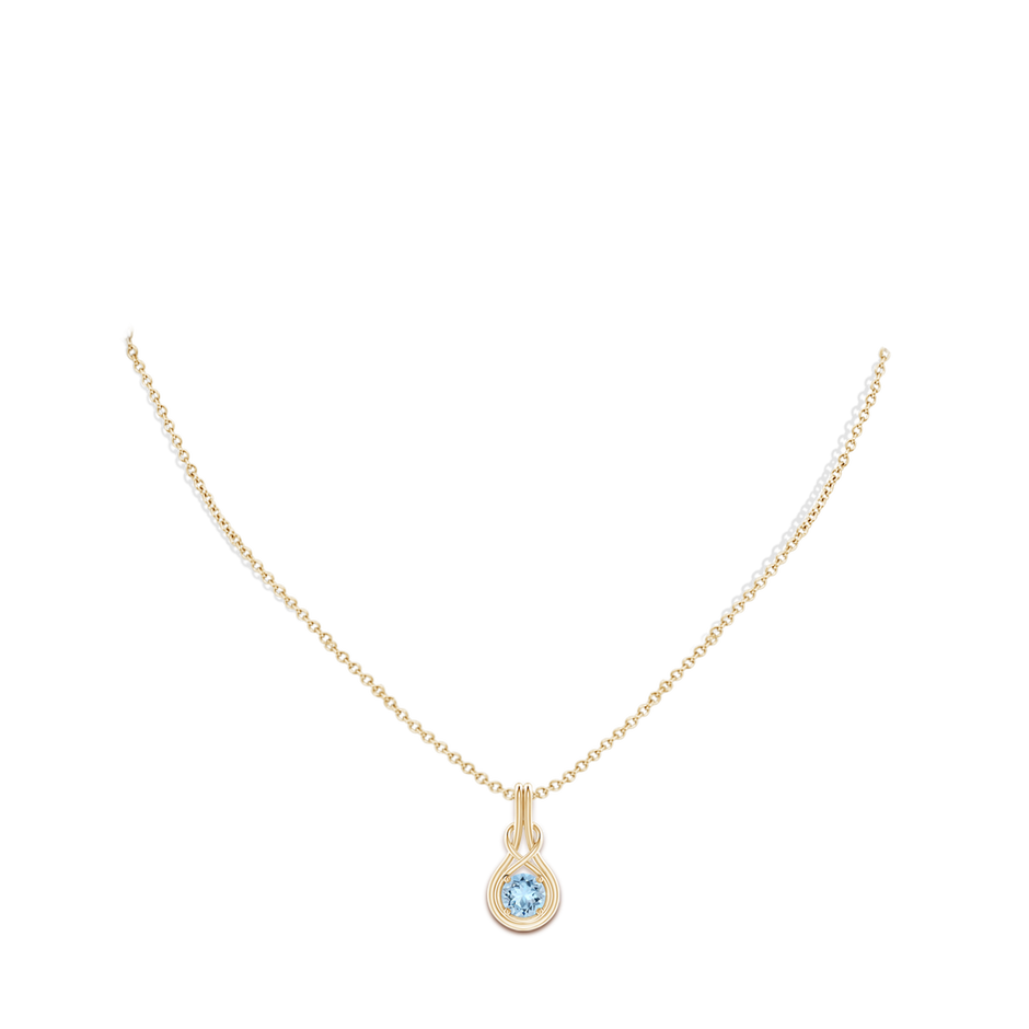 6mm AAA Round Aquamarine Solitaire Infinity Knot Pendant in Yellow Gold pen