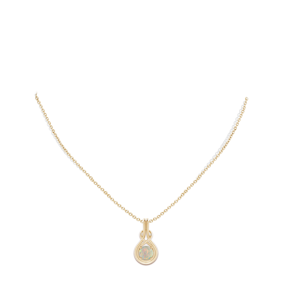 7mm AAAA Round Opal Solitaire Infinity Knot Pendant in 18K Yellow Gold pen