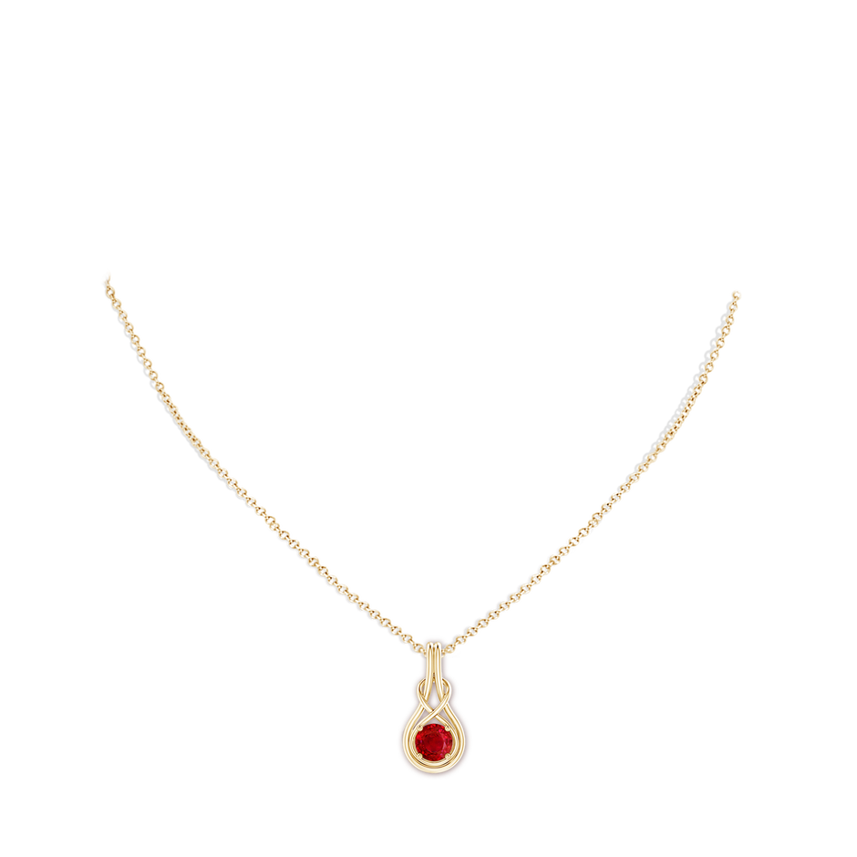 6mm AAA Round Ruby Solitaire Infinity Knot Pendant in Yellow Gold pen
