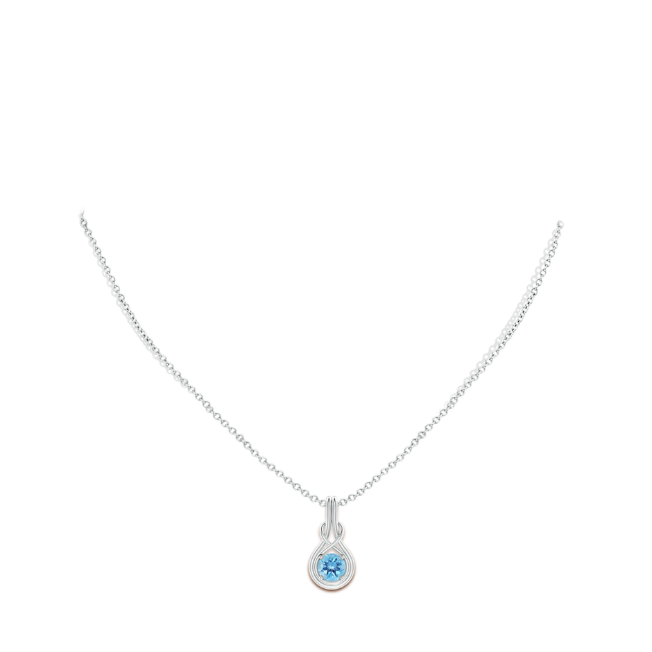 6mm A Round Swiss Blue Topaz Solitaire Infinity Knot Pendant in P950 Platinum pen