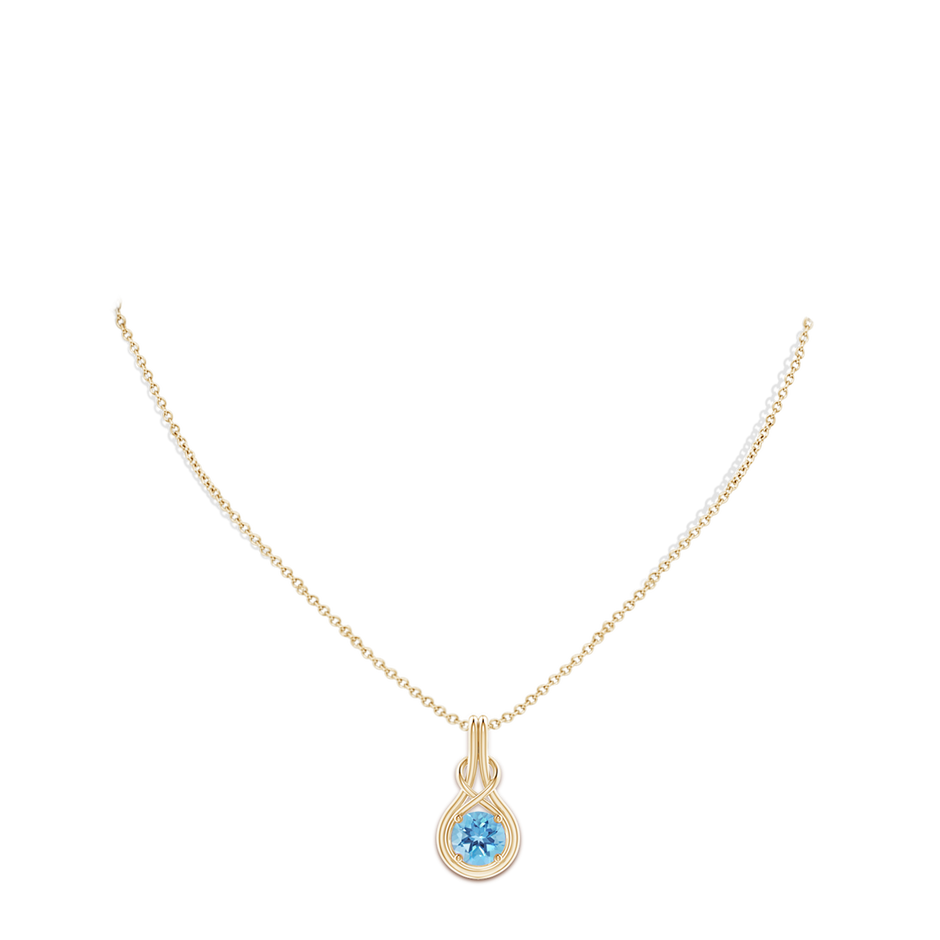 8mm A Round Swiss Blue Topaz Solitaire Infinity Knot Pendant in Yellow Gold pen