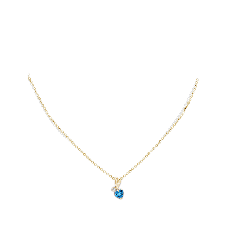 6mm AAAA Heart-Shaped Swiss Blue Topaz Ribbon Pendant with Diamond in Yellow Gold pen