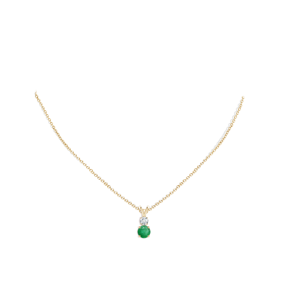 6mm A Round Emerald and Diamond Two Stone Pendant in Yellow Gold pen