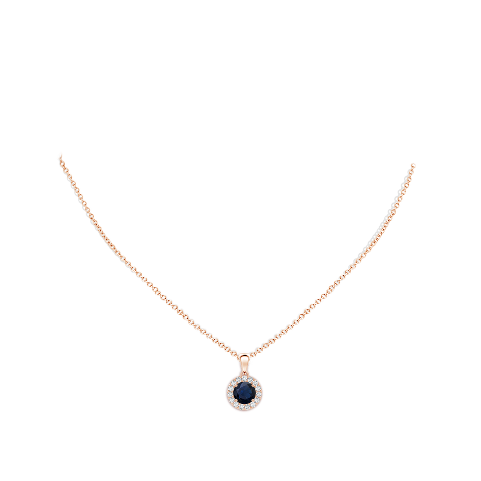 6mm A Round Blue Sapphire and Diamond Halo Pendant in Rose Gold body-neck