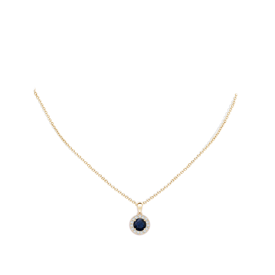 6mm A Round Blue Sapphire and Diamond Halo Pendant in Yellow Gold body-neck