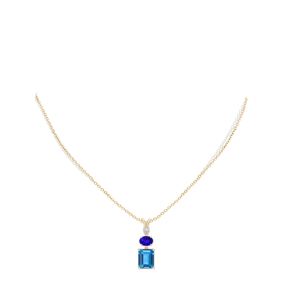 10x8mm AAAA Swiss Blue Topaz, Tanzanite and Diamond Three Stone Pendant in Yellow Gold pen