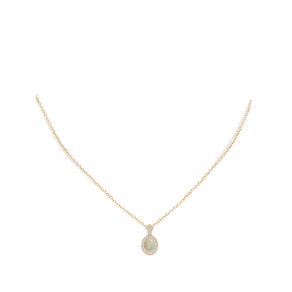 8x6mm AAAA Milgrain-Edged Oval Opal and Diamond Halo Pendant in Yellow Gold pen