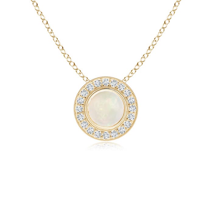 A - Opal / 0.66 CT / 14 KT Yellow Gold