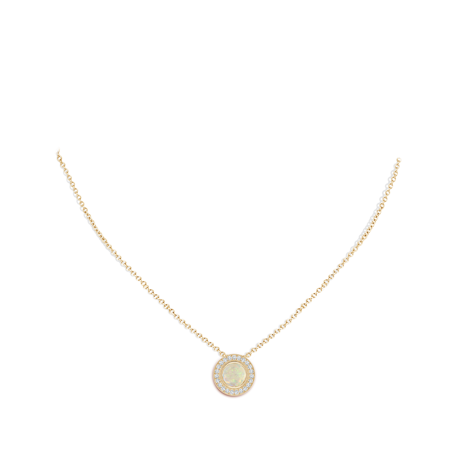 7mm AAA Bezel-Set Opal Pendant with Diamond Halo in Yellow Gold pen