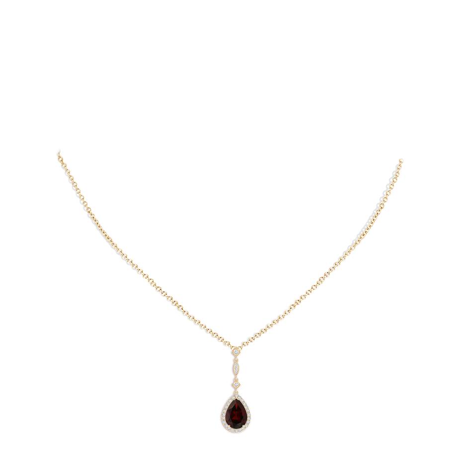 10x7mm A Prong-Set Garnet Teardrop Halo Pendant with Diamond Accents in Yellow Gold pen