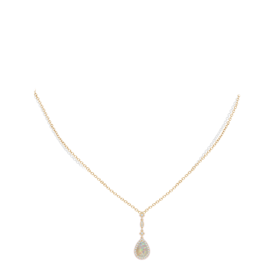 9x6mm AAAA Prong-Set Opal Teardrop Halo Pendant with Diamond Accents in Yellow Gold pen