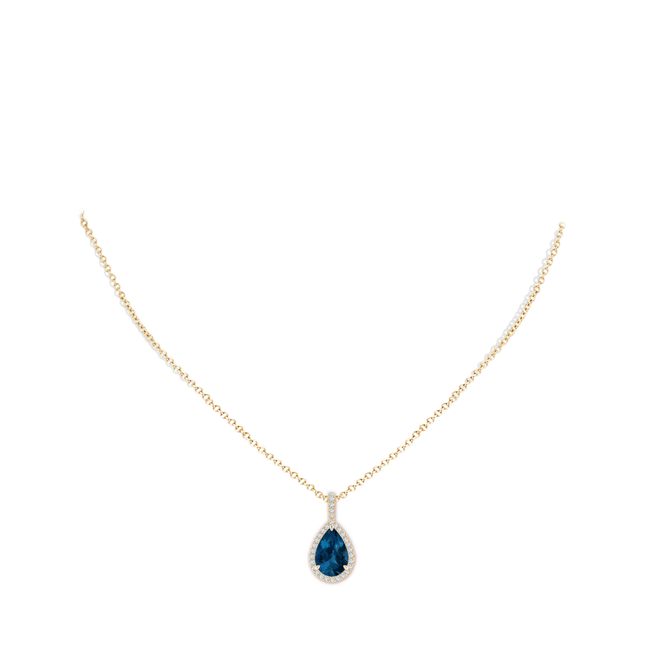 12x8mm AAA Claw-Set London Blue Topaz Teardrop Halo Pendant in Yellow Gold pen