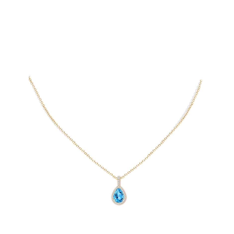 10x7mm AAA Claw-Set Swiss Blue Topaz Teardrop Halo Pendant in Yellow Gold pen