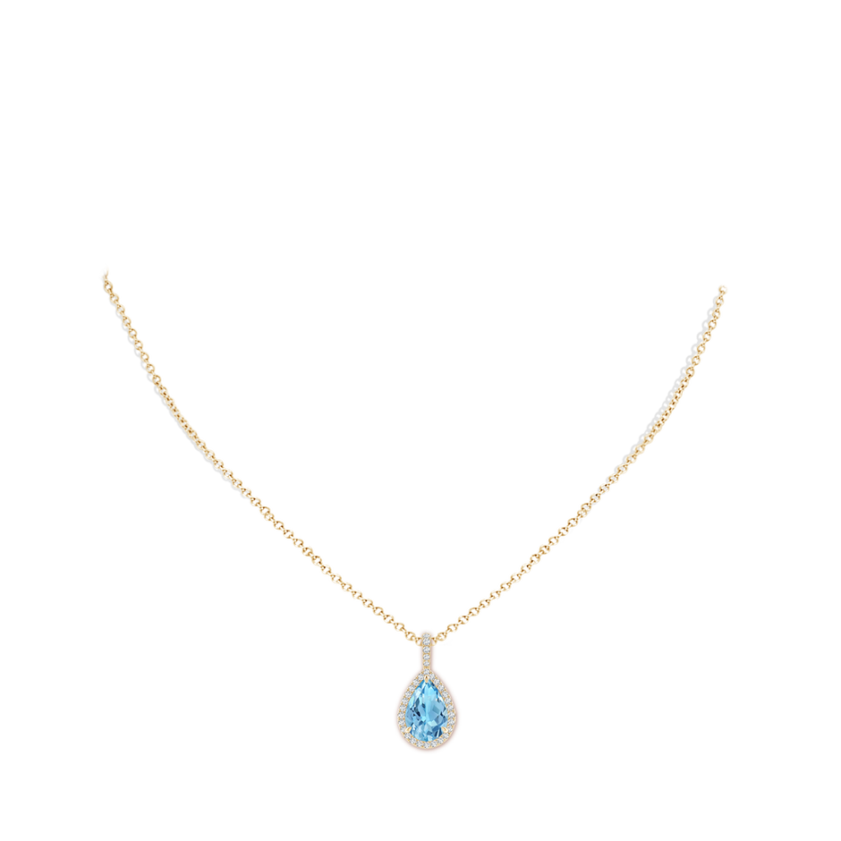 12x8mm A Claw-Set Swiss Blue Topaz Teardrop Halo Pendant in Yellow Gold pen