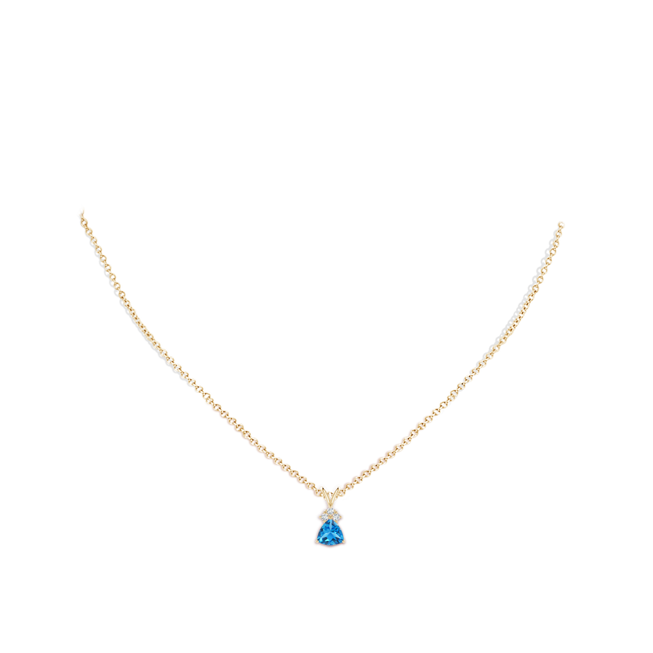 6mm AAAA Trillion Swiss Blue Topaz Solitaire Pendant with Trio Diamonds in Yellow Gold body-neck