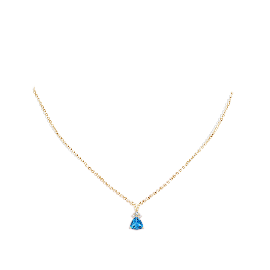 7mm AAAA Trillion Swiss Blue Topaz Solitaire Pendant with Trio Diamonds in Yellow Gold body-neck