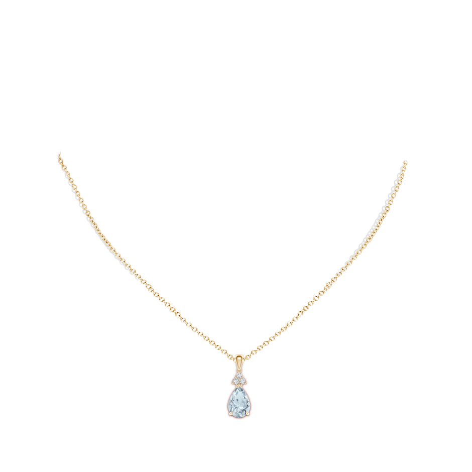 10x7mm A Claw-Set Aquamarine Drop Pendant with Trio Diamonds in Yellow Gold body-neck