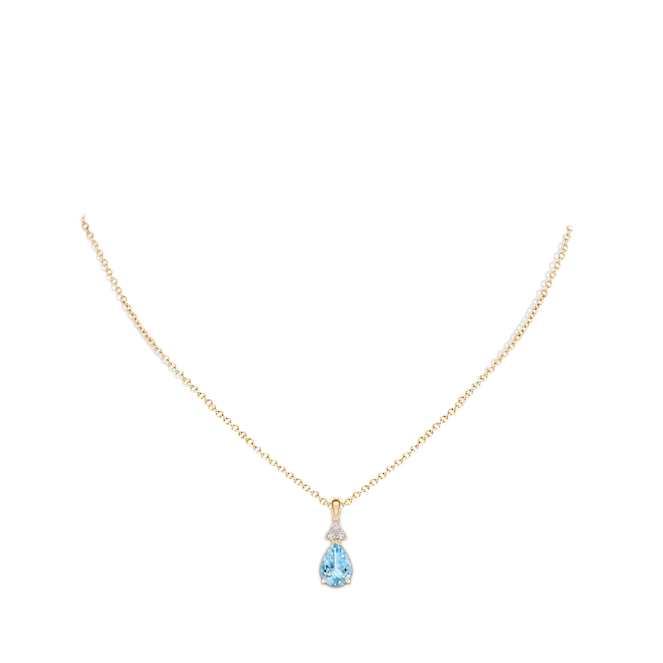 10x7mm AAAA Claw-Set Aquamarine Drop Pendant with Trio Diamonds in Yellow Gold body-neck