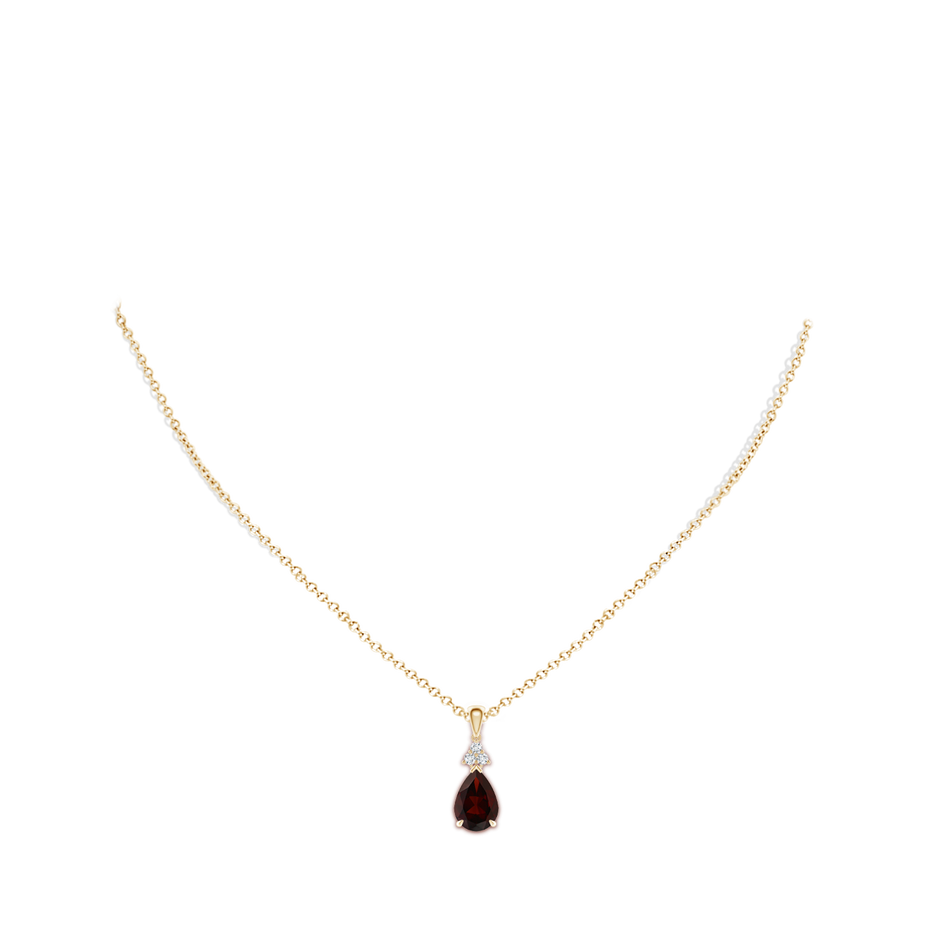 10x7mm A Claw-Set Garnet Drop Pendant with Trio Diamonds in Yellow Gold pen