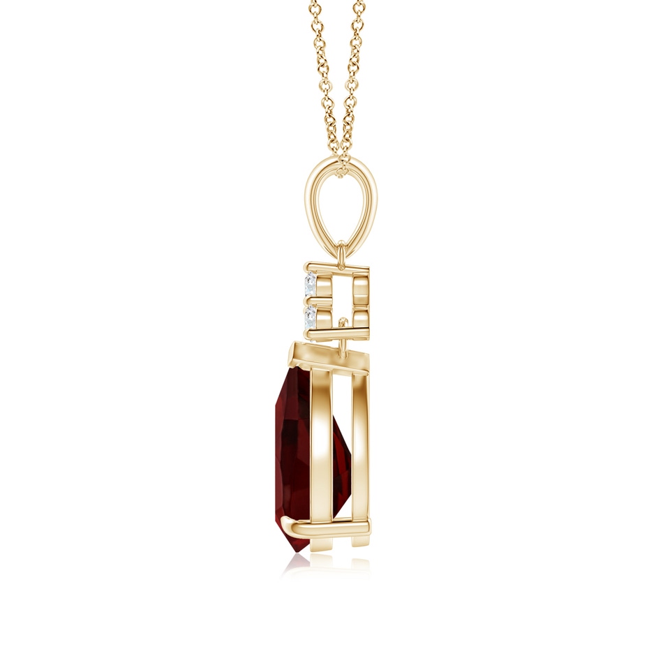 10x7mm AAA Claw-Set Garnet Drop Pendant with Trio Diamonds in Yellow Gold side 199