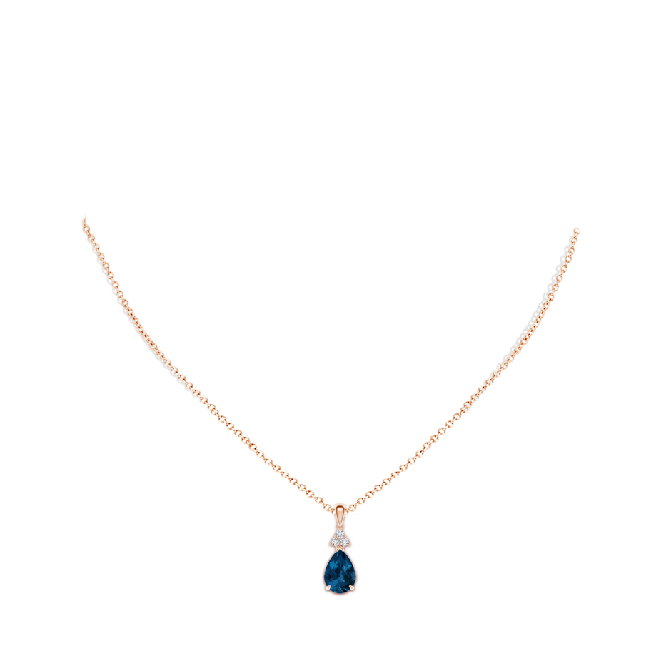 10x7mm AAA Claw-Set London Blue Topaz Drop Pendant with Trio Diamonds in Rose Gold pen