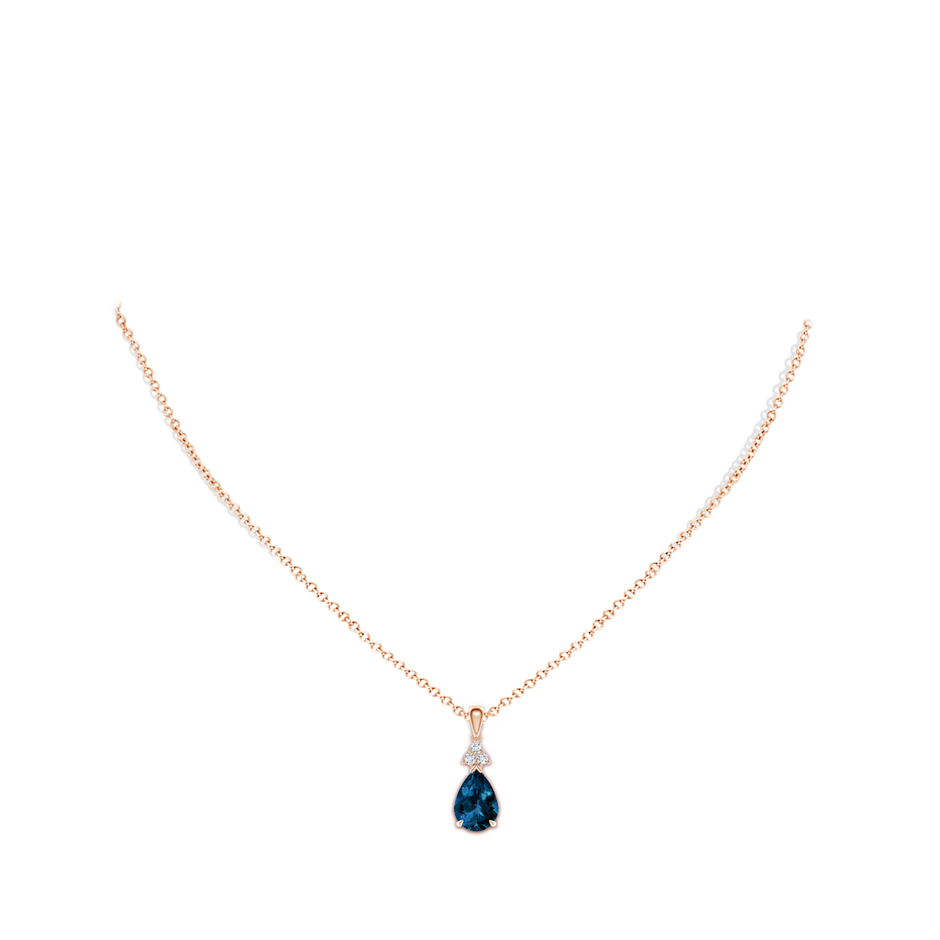 10x7mm AAAA Claw-Set London Blue Topaz Drop Pendant with Trio Diamonds in Rose Gold pen