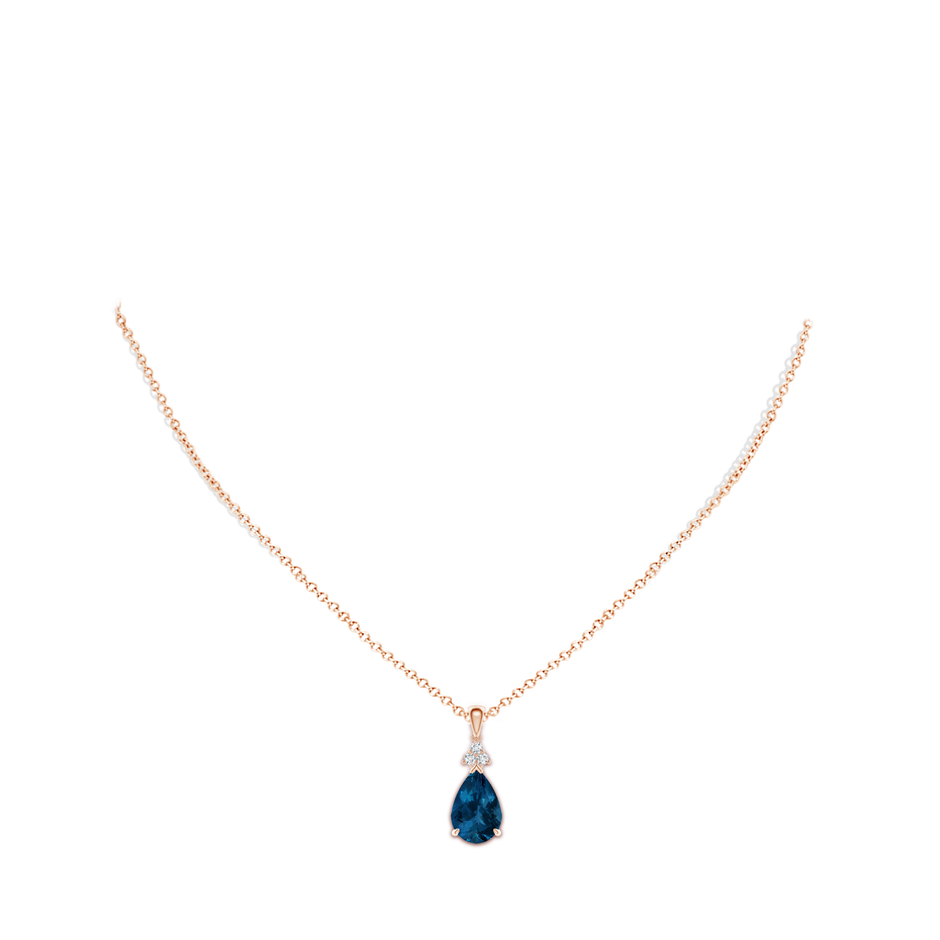 12x8mm AAA Claw-Set London Blue Topaz Drop Pendant with Trio Diamonds in Rose Gold pen
