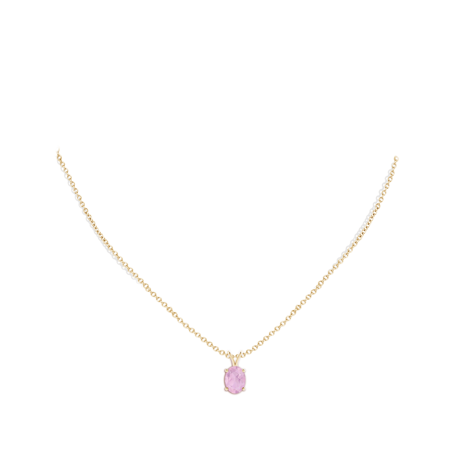 8x6mm AAAA Prong-Set Oval Rose Quartz V-Bale Solitaire Pendant in Yellow Gold body-neck