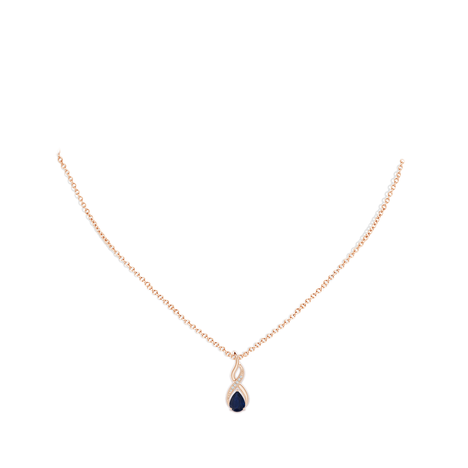 7x5mm A Blue Sapphire Infinity Swirl Pendant with Diamonds in 9K Rose Gold pen