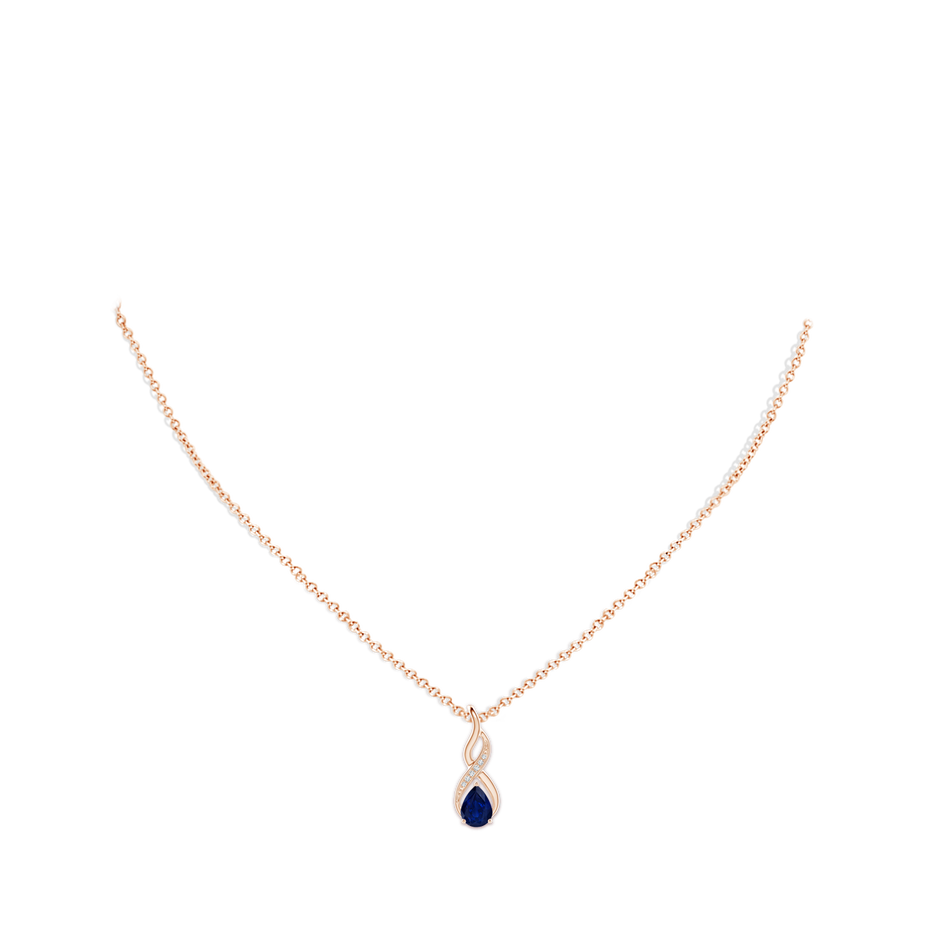 7x5mm AA Blue Sapphire Infinity Swirl Pendant with Diamonds in Rose Gold pen