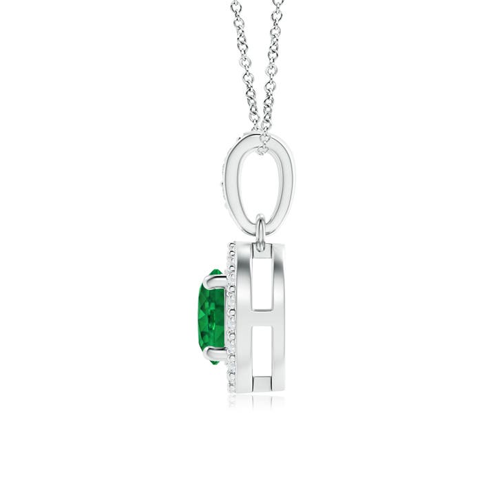 AAA - Emerald / 0.58 CT / 14 KT White Gold