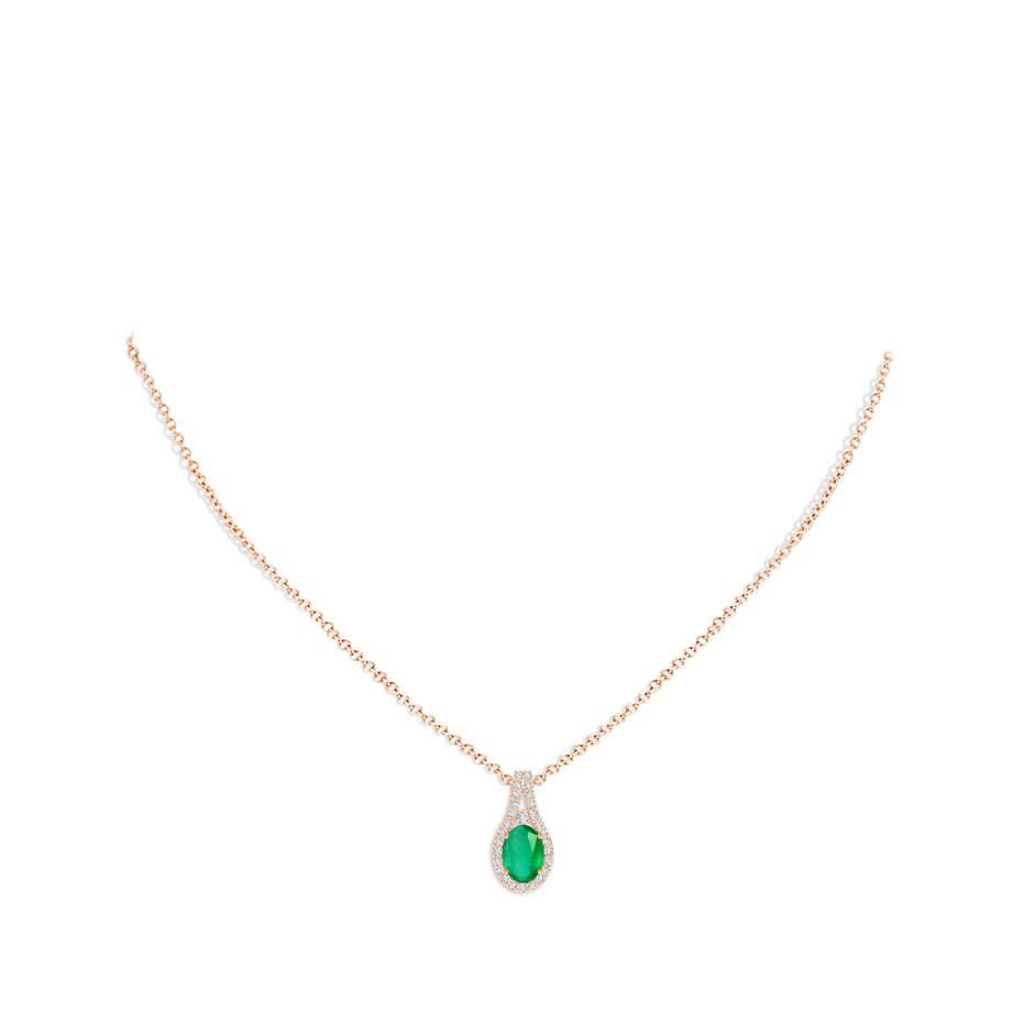 7x5mm A Classic Emerald and Diamond Halo Pendant in Rose Gold pen