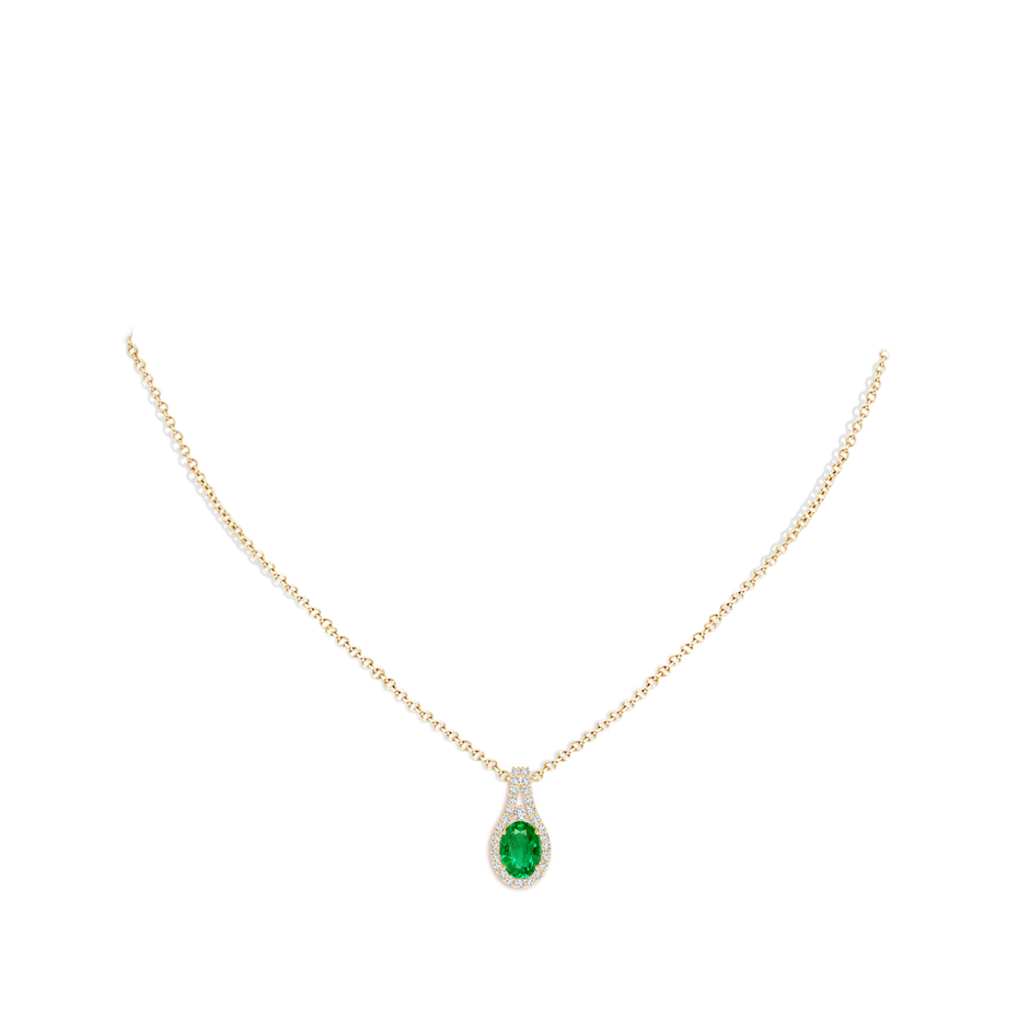 7x5mm AAA Classic Emerald and Diamond Halo Pendant in Yellow Gold pen