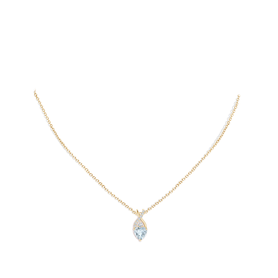 7mm A Solitaire Heart Aquamarine Pendant with Twisted Diamond Bale in Yellow Gold pen