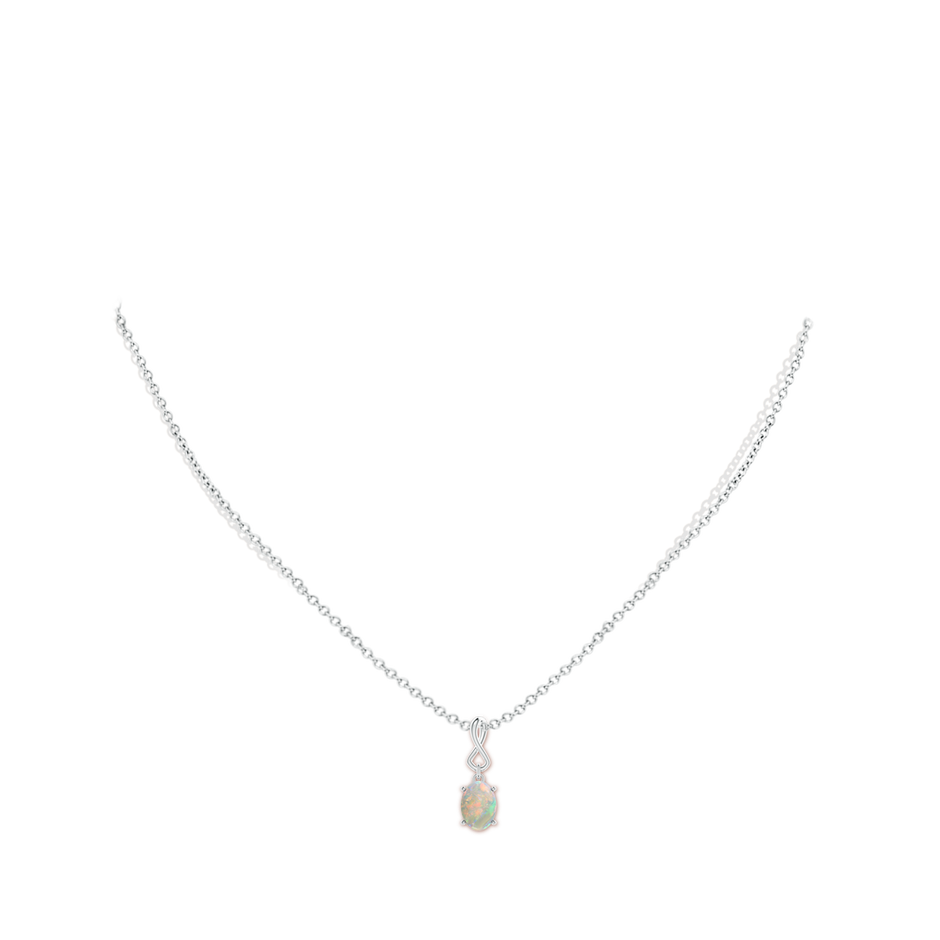 7x5mm AAAA Oval Opal Dangle Pendant with Infinity Loop Bale in White Gold pen