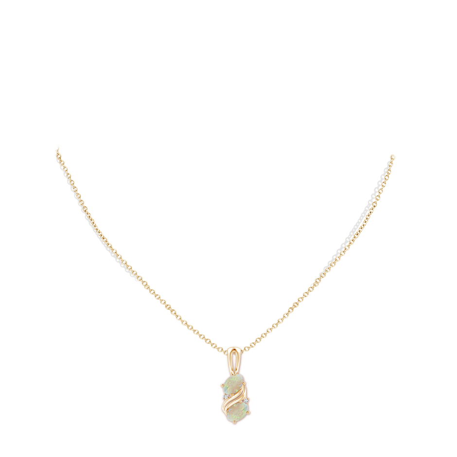7x5mm AAA Two Stone Opal Swirl Pendant in Yellow Gold pen