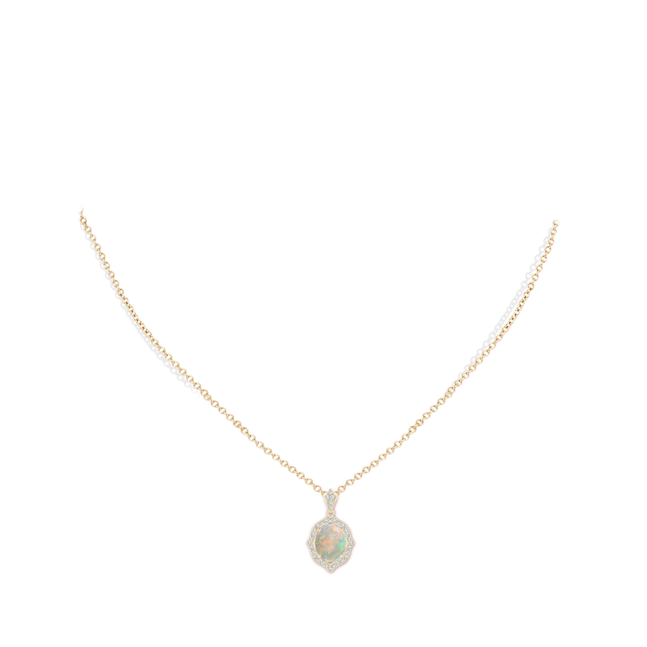 10x8mm AAAA Scalloped Frame Oval Opal and Diamond Halo Pendant in Yellow Gold pen