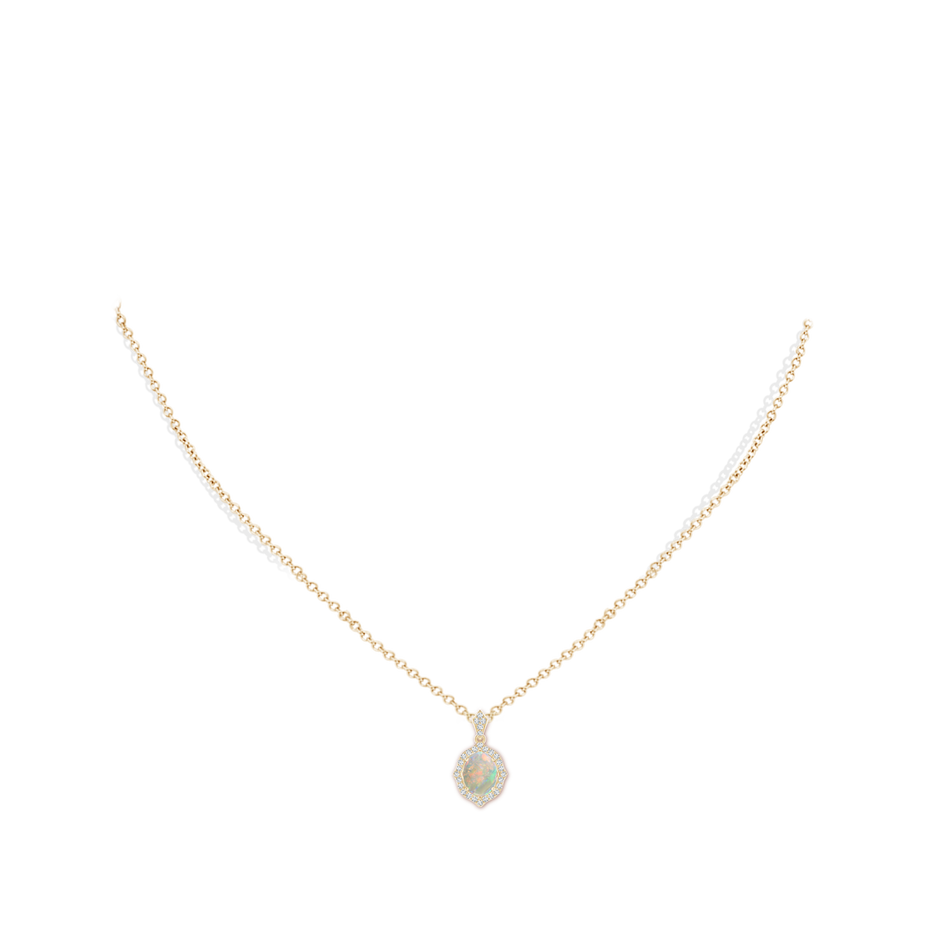 8x6mm AAAA Scalloped Frame Oval Opal and Diamond Halo Pendant in Yellow Gold pen