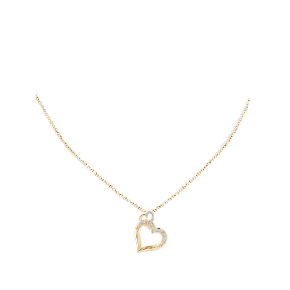 1.1mm GVS2 Interlinked Diamond Tilted Heart Pendant in Yellow Gold pen