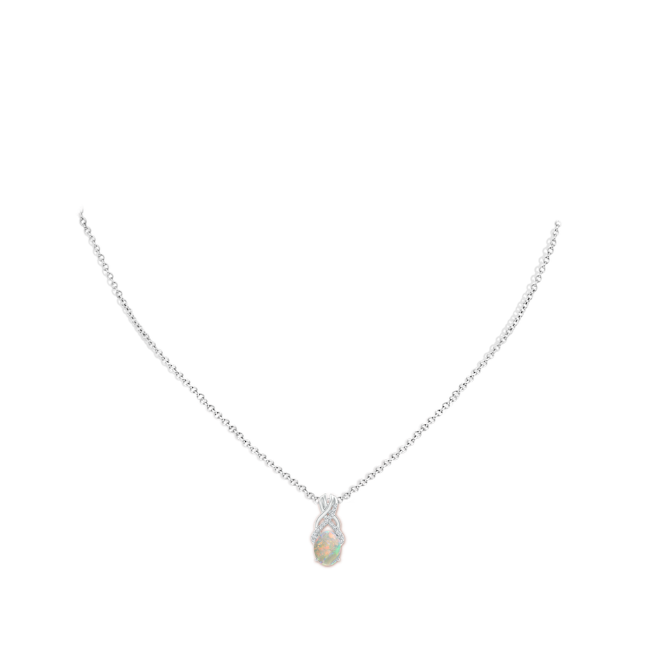 8x6mm AAAA Oval Opal Criss Cross Pendant with Diamonds in P950 Platinum pen